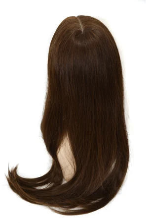 Front view of the topper showing the free part style and natural hairline blend