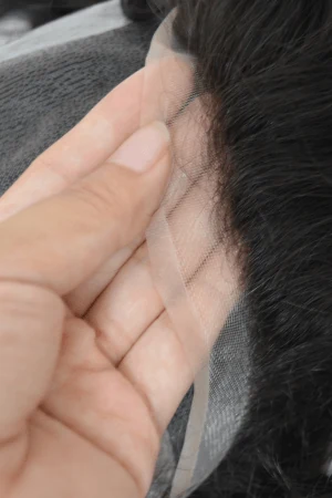 Aegis hair system styled on a mannequin head showing the front parting