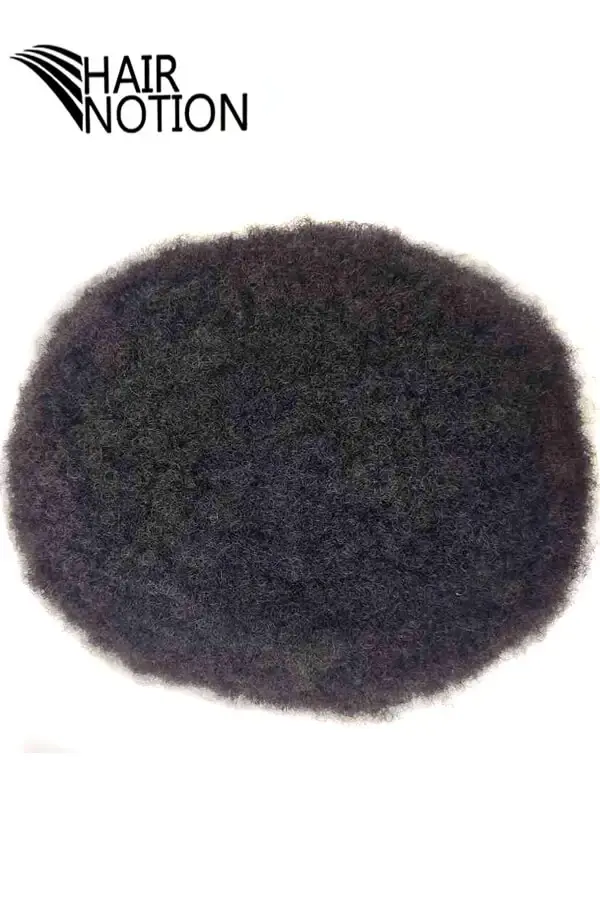 Close-up of the bleached front knots on the afro curly toupee for a seamless hairline