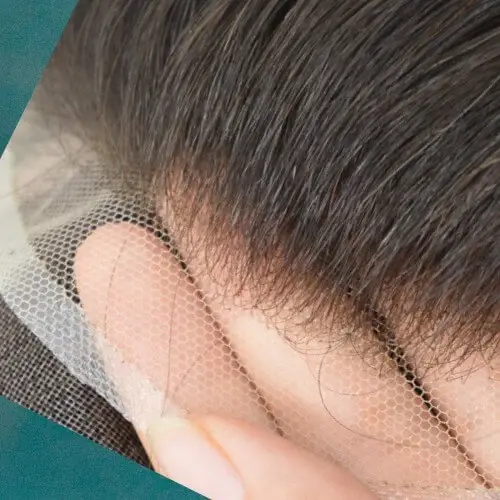 Underside of the toupee showing the three poly-lines at the back for trimming guidance