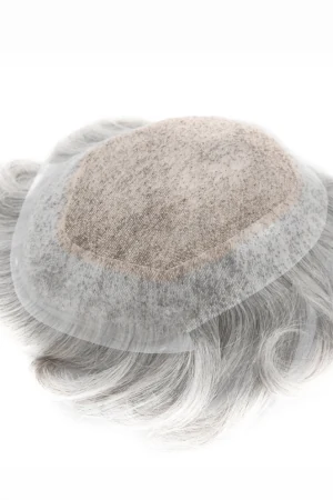 Toupee styled on a mannequin head showing the full front and side profile