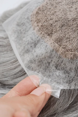 Side view of the toupee showing the flexible PU perimeter and lace base