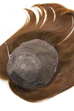 SAURA half wig styled on a mannequin head showing the natural hairline and fullness