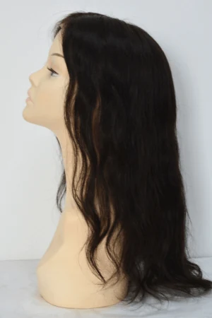 QWT hair topper styled on a mannequin head showing the crown volume and natural parting