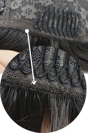 Close-up of the silk top base showing the smooth, natural scalp appearance