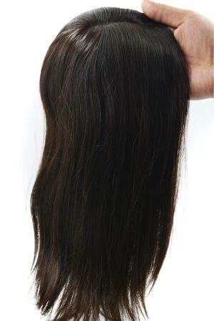 Side view of the SAURA topper showing the clip placement and hair length