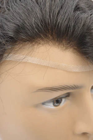 Underside of the LACN lace front showing the clear PU base and lace perimeter
