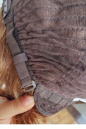 LSM wig worn on a model head, showing the natural hairline and overall fit