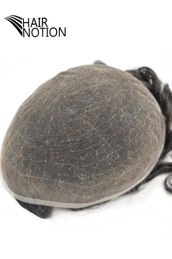 Custom French lace men's hair system shown from above with the front hairline visible and the hair combed back
