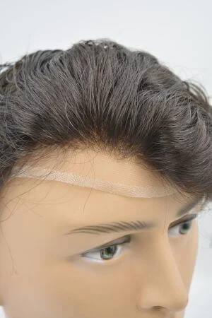 Underside of the men's hair system showing the 1 inch PU strip across the back