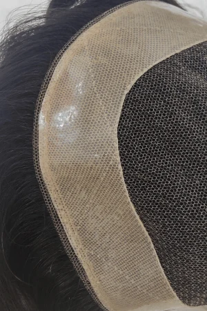 Real human hair toupee styled on a mannequin head with a natural parting and 3.0 cm wave