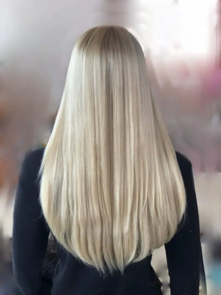 Side view of the Mona wig showing the 4 by 4 inch lace front and the natural hairline