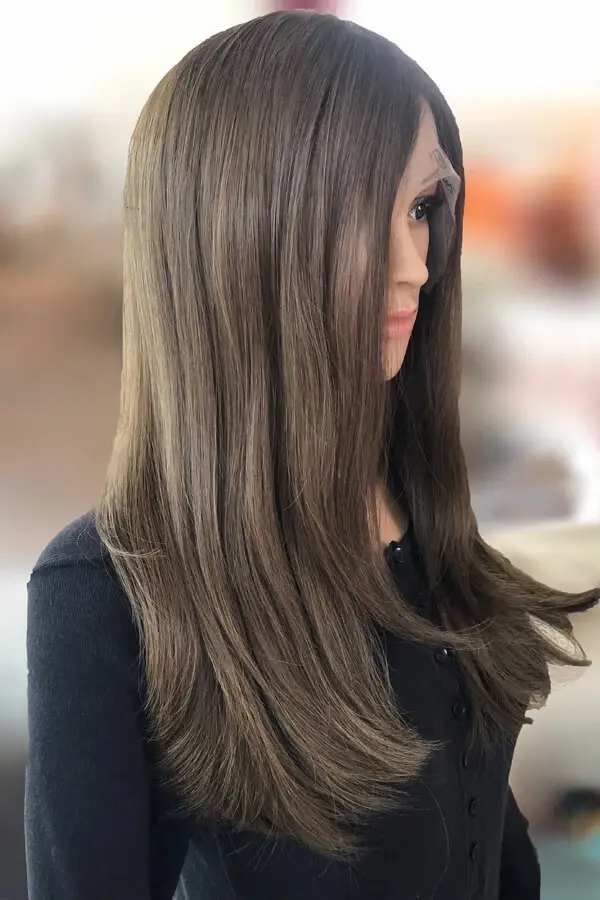 Close-up of the lace front and hairline showing the hand-tied knots and natural root transition