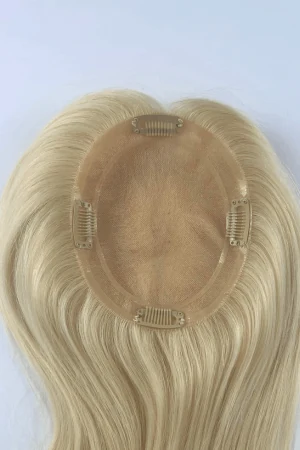 SCHRM mono topper for women shown from above with the four clips visible at front, back, left and right