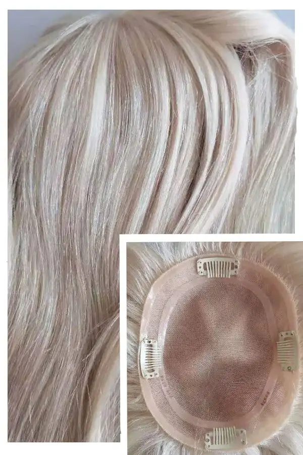 Woman's hair topper on a transparent mono base with PU layer, shown from above with the front hairline visible