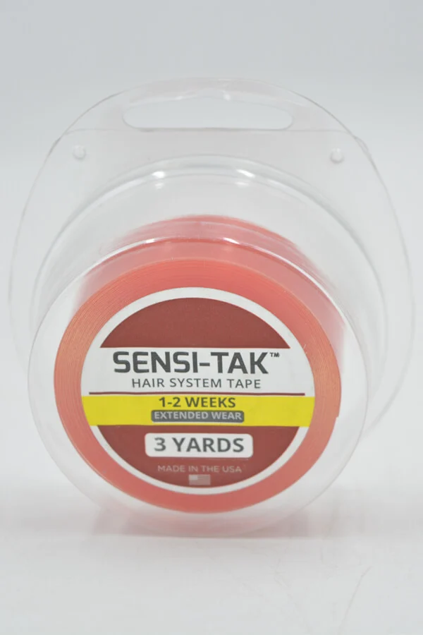 SENSI-TAK tape applied to a hair system base, showing the clean, invisible bond at the hairline