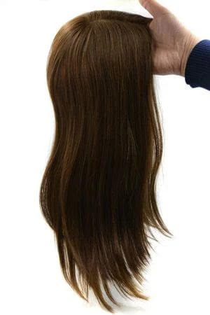 Close-up of the silk top base showing the soft, natural-looking scalp surface