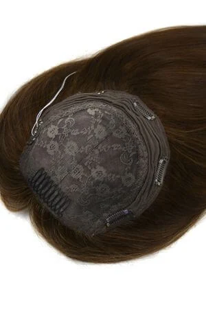 SAURA topper displayed with other hair toppers in a product display