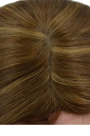 Side view of the SAURA topper showing the soft silk top base and clip placement