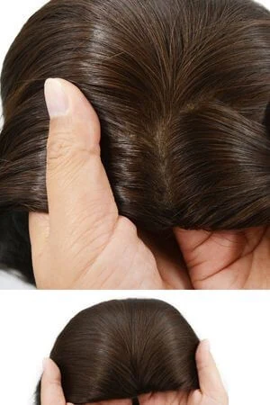 Close-up of the SAURA silk top base showing the smooth, scalp-like texture