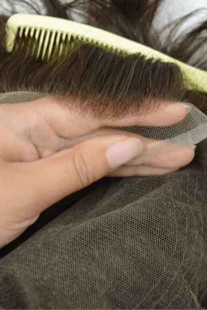Underside of the SFS Swiss lace base showing the thin, translucent lace perimeter