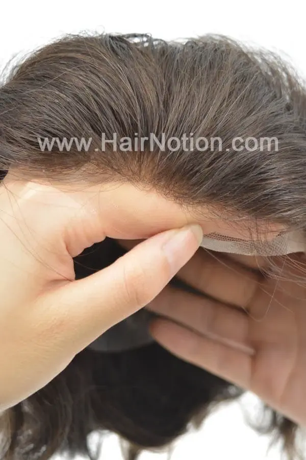 Q7-DE French lace front men's hair system shown from above with the front hairline visible