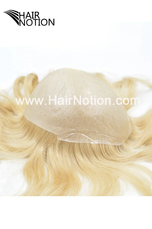 STS super thin skin men's hair replacement system shown from above with the front hairline visible