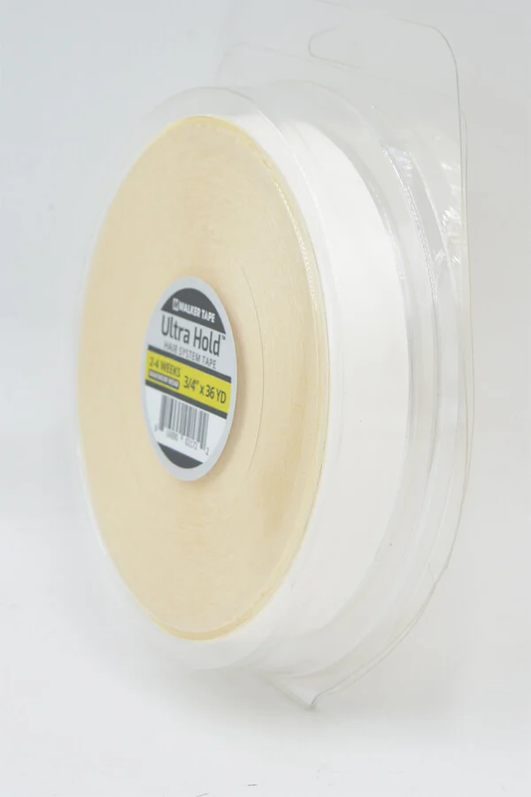 Tape being applied to a hair system base with a clean, even press