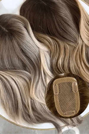 DIVN silk top women's hair topper shown from above with the front hairline visible