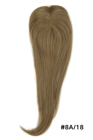 DIVN hair topper styled on a woman's head showing the crown coverage and natural parting