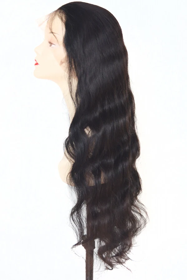 Wig styled on a mannequin head showing the full length and body wave texture