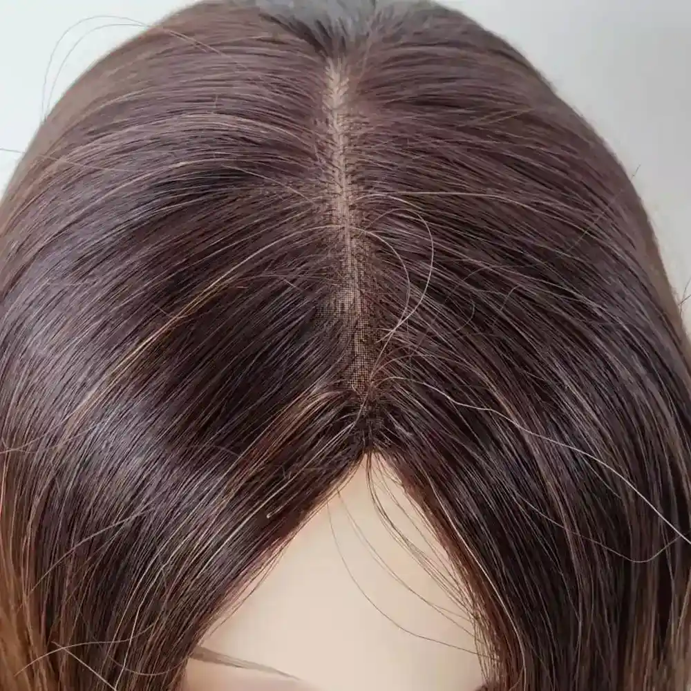Close-up of the lace hairline and silk top base for texture and blending details