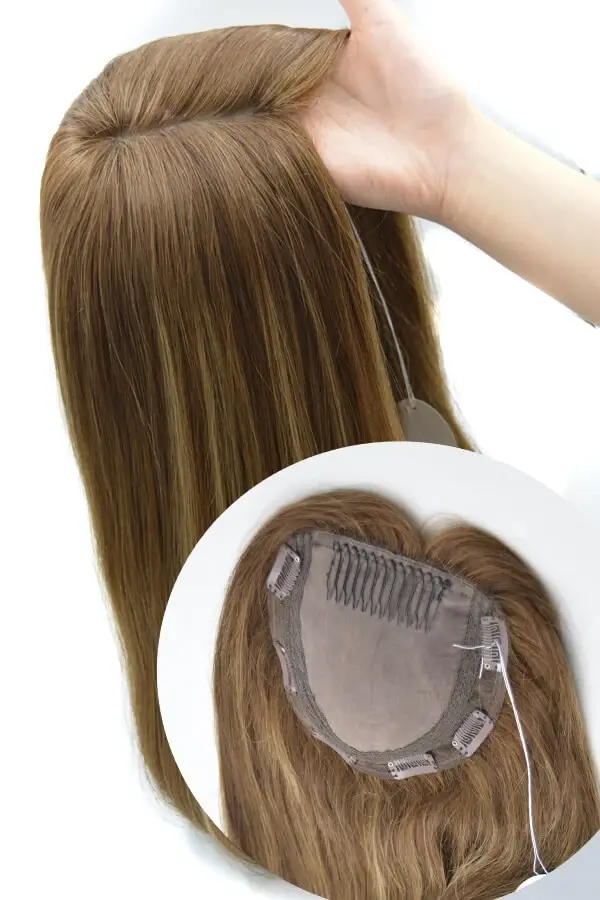 Women's topper with full Swiss lace base shown from above with the front hairline visible