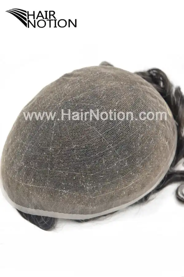 Custom LT 410# men's hair system shown from above with the freestyle hairline and grey blend visible