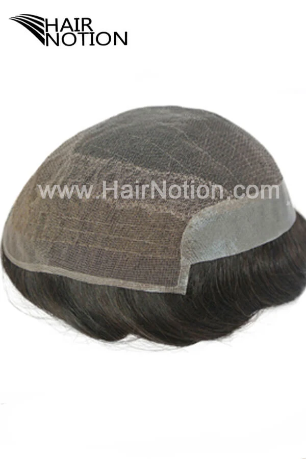 Custom toupee shown from above with the front hairline visible and a natural parting