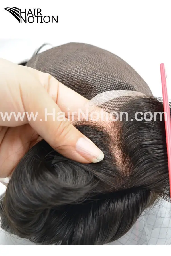 Custom FWM durable natural full fine welded mono toupee for men shown from above with the front hairline visible