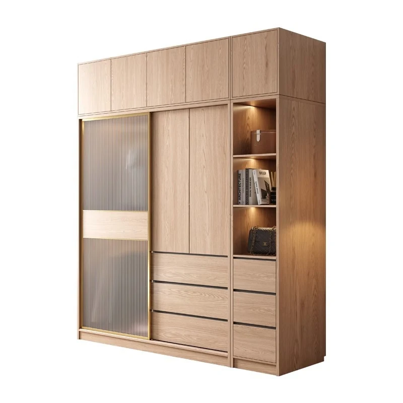 Light oak sliding door wardrobe with a frosted glass panel and an illuminated open display section