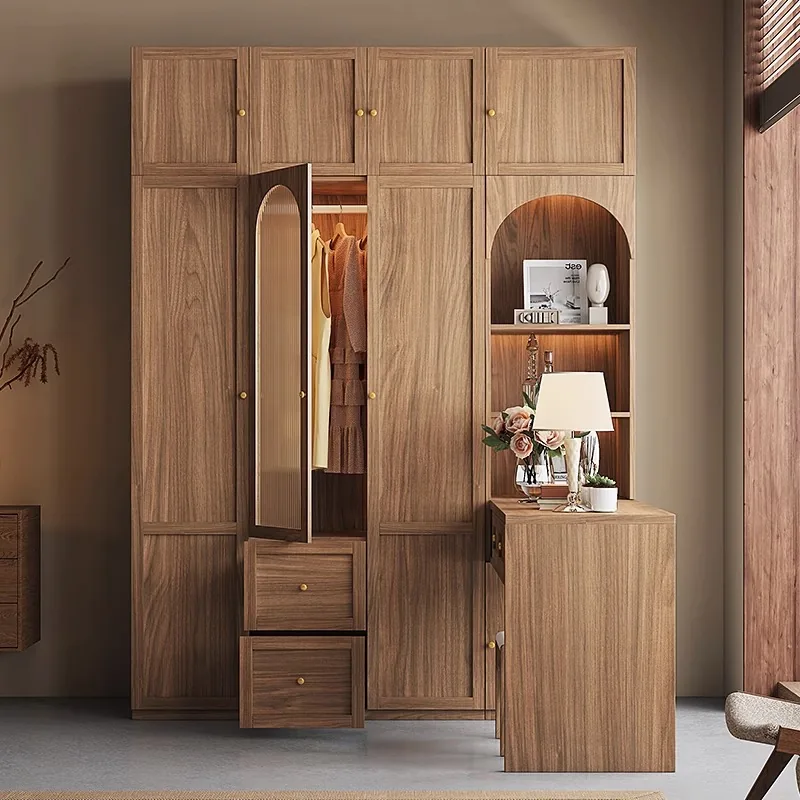 Walnut finish wardrobe with arched ribbed glass doors beside a matching dressing table and stool