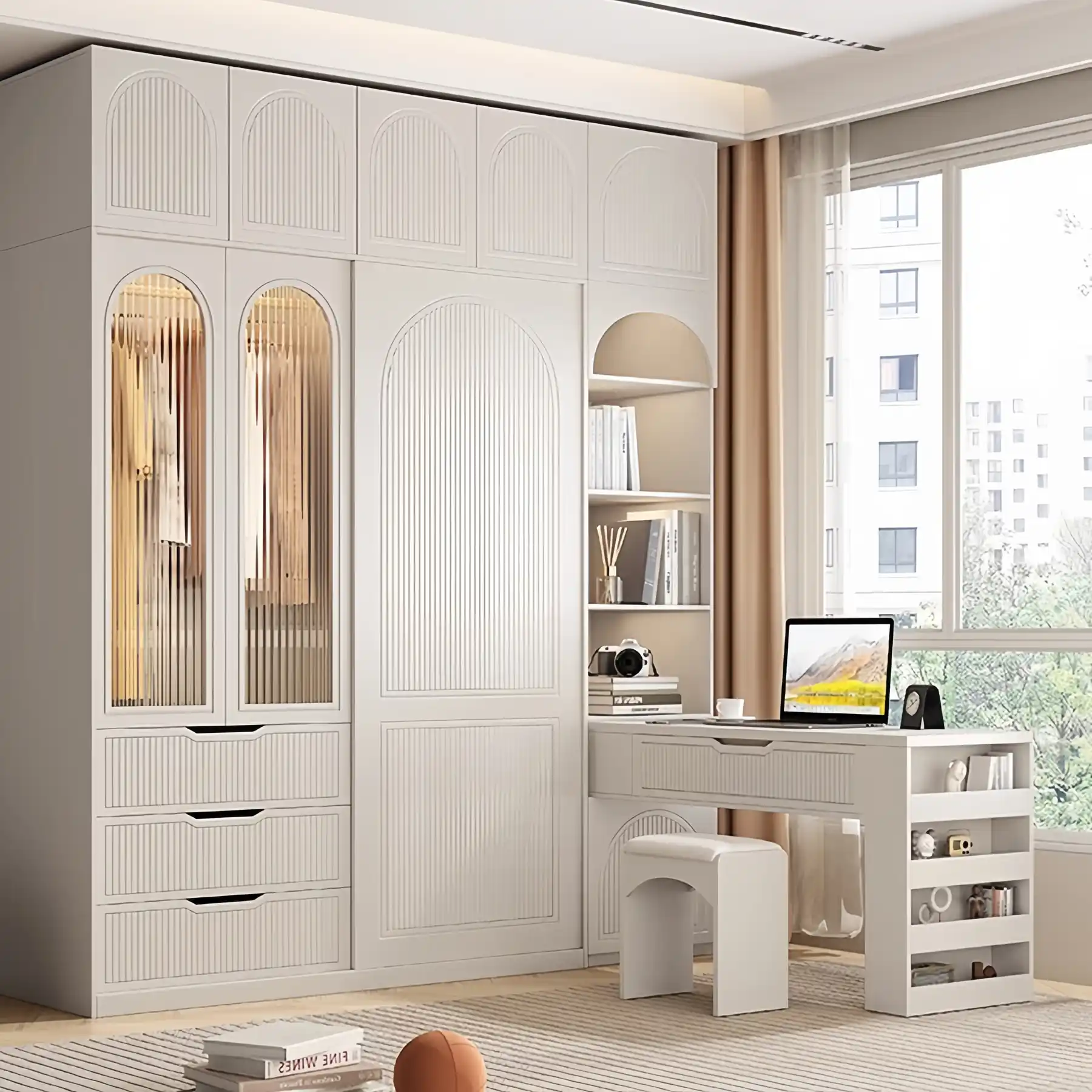 Cream wardrobe with arched door panels and an integrated desk and shelving column
