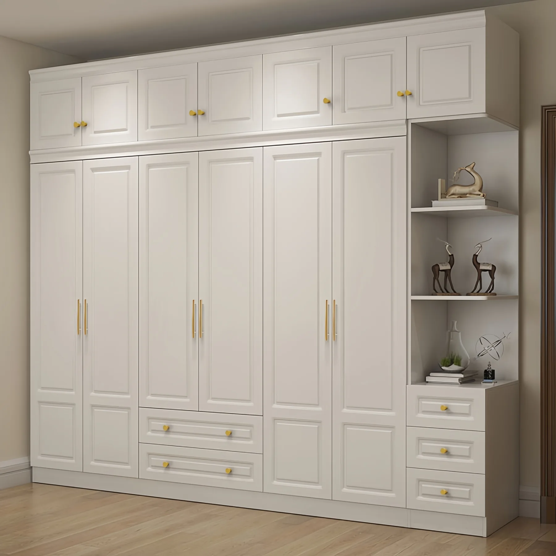 Cream six door raised panel wardrobe with top boxes and an open display shelf tower at one end