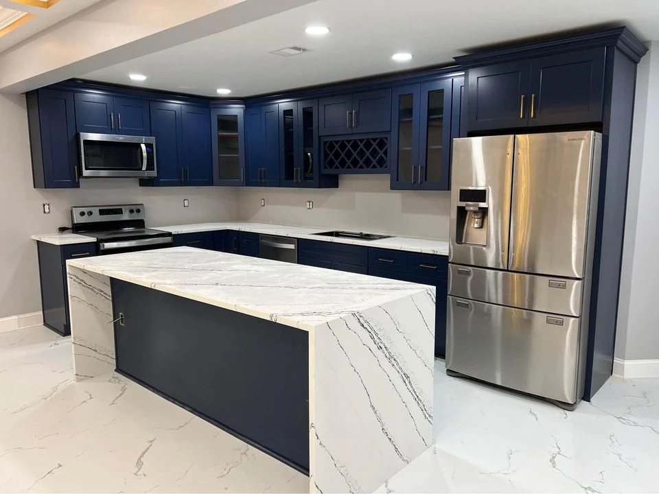 Shaker kitchen set installed with a stone island top