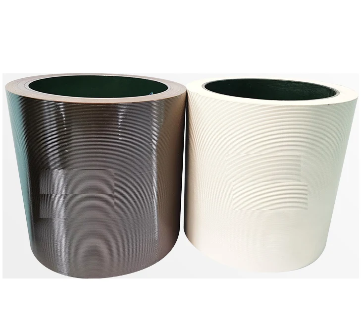 Pair of rubber rollers for a paddy husker with bonded rubber on steel drums