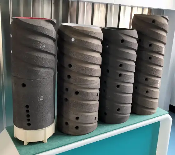 Whitener roller assembly with shaft and abrasive sleeve