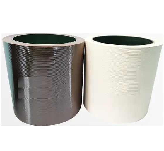 Pair of rubber rollers for a paddy husker with bonded rubber on steel drums