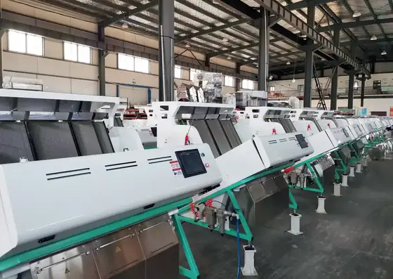 Optical sorters in final assembly at the Hefei workshop, wired and staged for run testing.