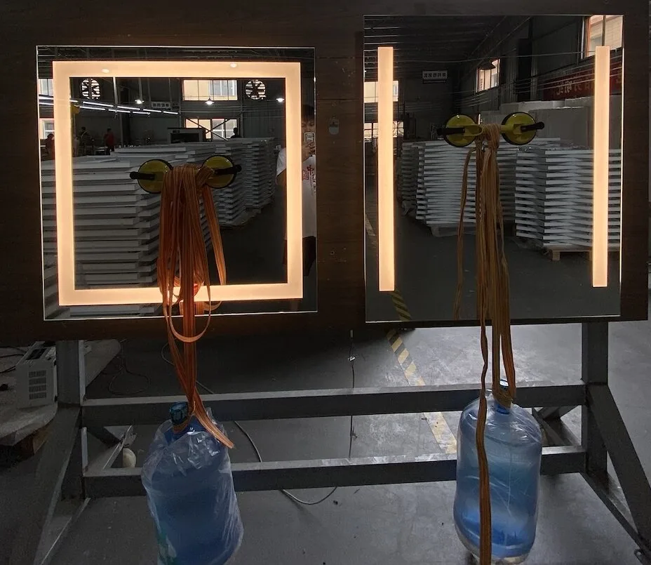 Load bearing safety test on a lighted mirror mounting system