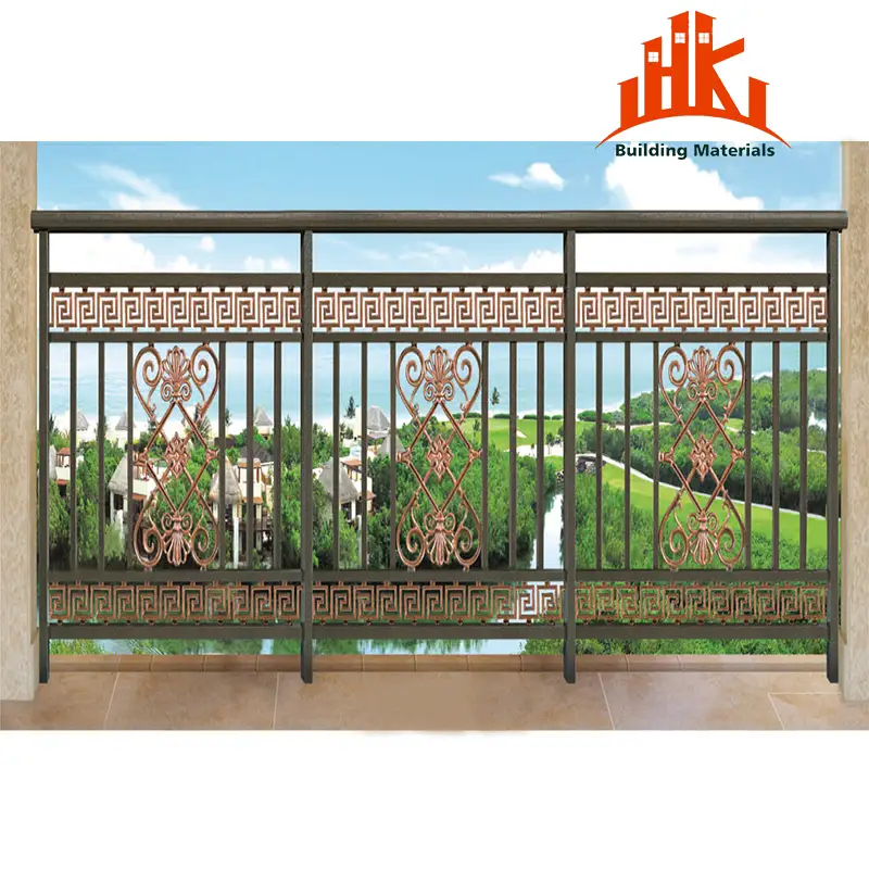 Decorative metal balcony railing with copper geometric patterns against a golf course background.