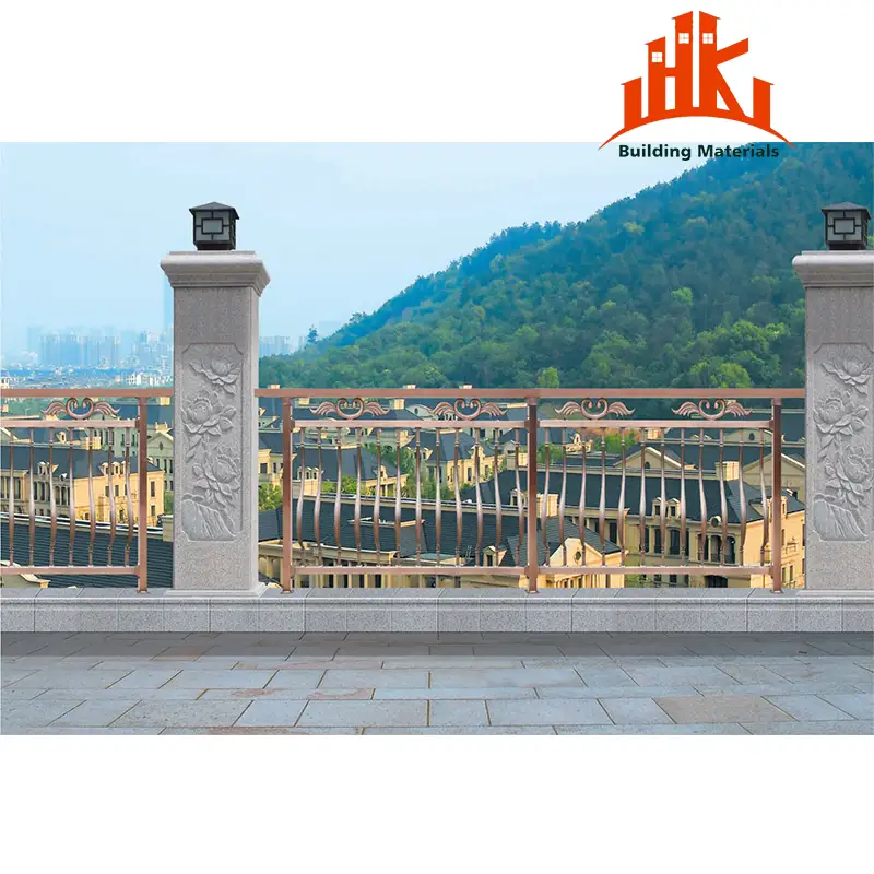 Stone and metal balcony railing with decorative carvings and top lamps.