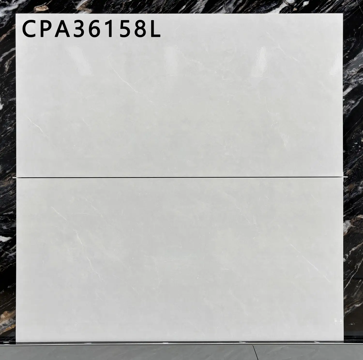 Two large white marble-look rectangular tiles stacked vertically with code CPA36158L