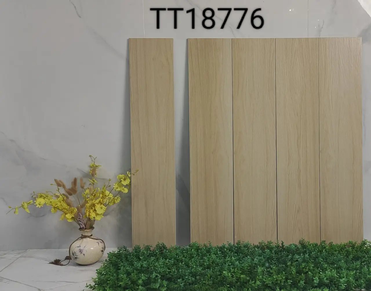 Samples of light wood-grain tiles with product code TT18776